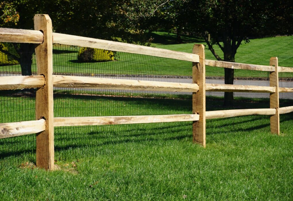 Split rail fence construction in Paris, Texas